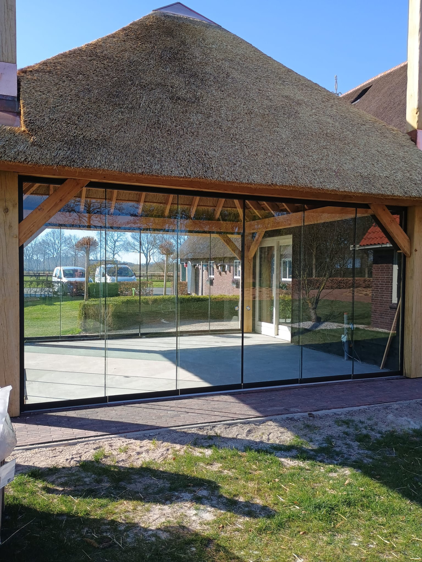 Glazen schuifwand in Norg